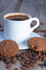 Fresh coffee with biscuits and roasted beans