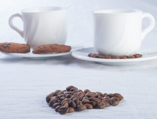 Fresh coffee with biscuits and roasted beans