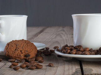 Fresh coffee with biscuits and roasted beans