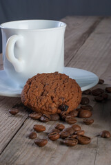 Fresh coffee with biscuits and roasted beans