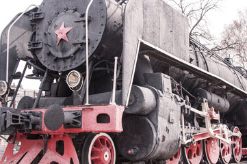 Russia, Tyumen, City Park: Elements of a vintage steam locomotive