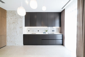 Modern interior design of the new kitchen. Stylish and functional work area