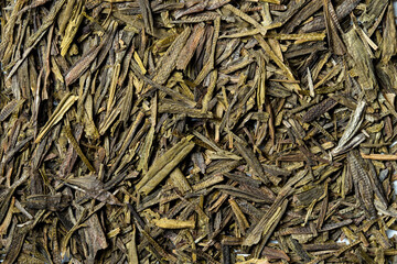 Long jing tea on white background. Top view. Close up. High resolution