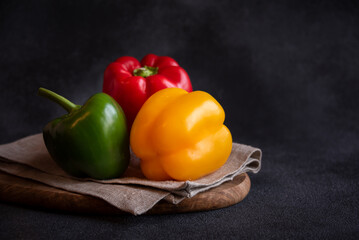 Fresh bell peppers of different colors, healthy vegetable vitamins