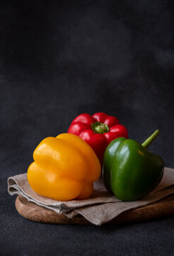 Fresh bell peppers of different colors, healthy vegetable vitamins