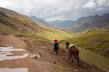 Fototapete Vinicunca Peruvian woman with a horse at Vinicunca Rainbow mountain, Cusco province, Peru
