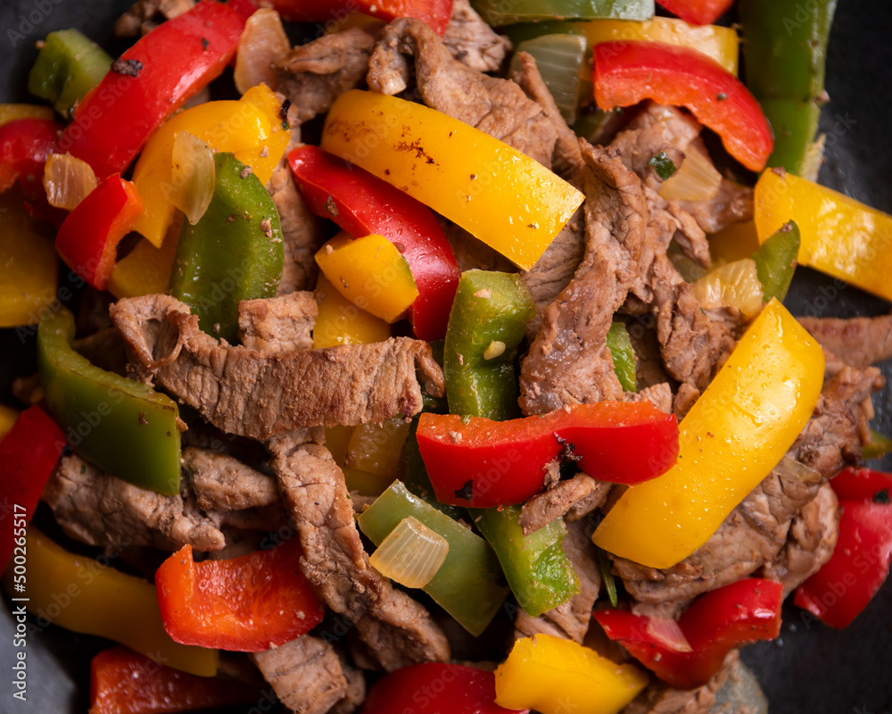 Wall mural cooked bell peppers with meat, healthy vegetable dish