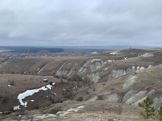 gray chalk hills in cloudy weather