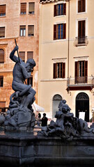 Fototapeta premium The Fountain of Neptune (Fontana del Nettuno), a fountain located at the north end of the Piazza Navona, Rome