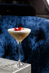 Coffee cocktails and liquor on blue reflective background. Copy space for your text.