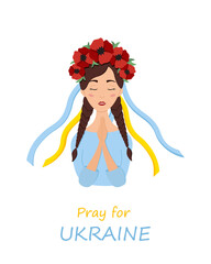 Beautiful ukrainian woman in a wreath with poppies prays for Ukraine. Stop war.