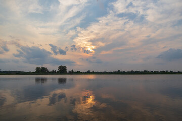 Sunset and cloudscape over a lake