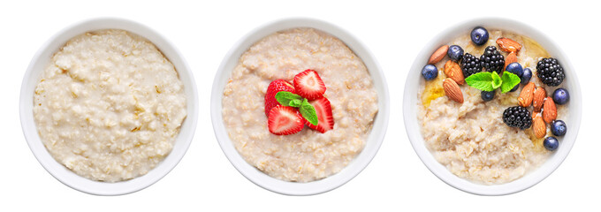 Set of bowl of oats porridge isolated on white background. Top view.
