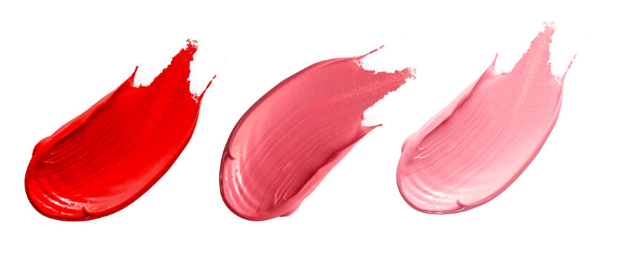 Set of pink lipstick smears isolated on white background.