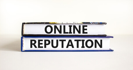 Online reputation symbol. Books with concept words Online reputation on beautiful white background. Business online reputation concept. Copy space.