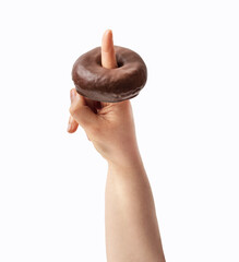 Chocolate donut on a woman's finger isolated on a white background.