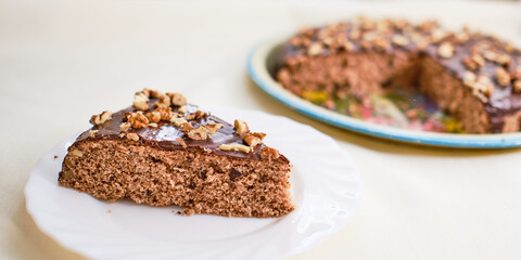Piece of walnut cake with chocolate