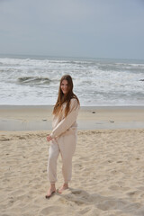 Fototapeta na wymiar young girl happy on the beach ocean