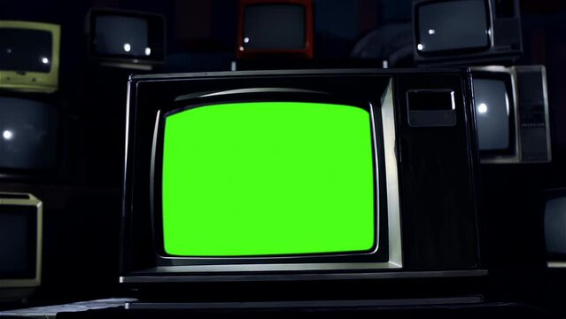 Stacked Vintage Television Green Screen. Dolly Out. You can replace green screen with the footage or picture you want. You can do it with &ldquo;Keying&rdquo; effect in After Effects. 4K.