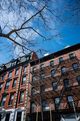 Fototapeta na wymiar The brick facade of apartments in Manhattan, New York City, NY
