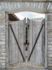 Locked old white wooden door