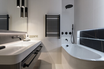 luxury bathroom in black and white, black accessories in a stylish bathroom