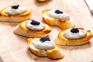 anchovy spread on toasted baguette slices