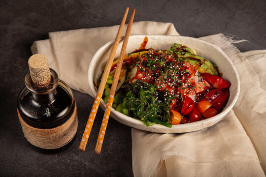 Delicious poke bowl with various ingredients