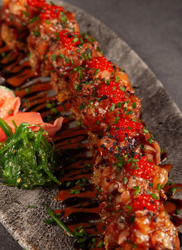 Delicious sushi rolls with salmon