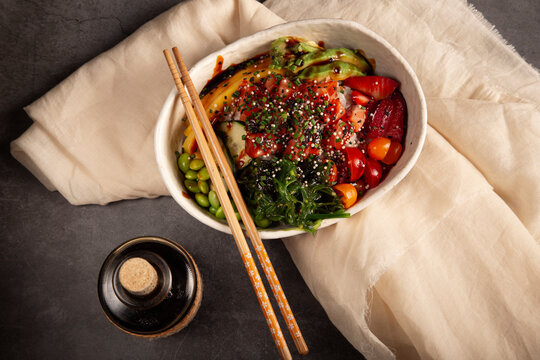 Delicious poke bowl with various ingredients