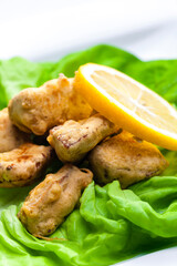 fried surimi stick with lemon