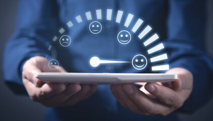Man holding tablet. Customer emotions satisfaction meter