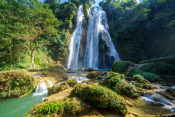 Fototapeta na wymiar The lush green of Anesakhan (Dat Taw Gyaint) Waterfall, Pwin Oo Lwin, Myanmar