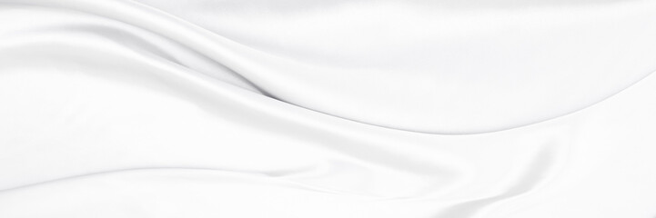 White gray satin texture that is white silver fabric silk panorama background with beautiful soft blur pattern natural.