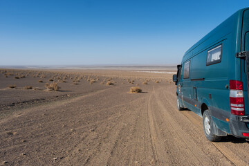 Silk Road landscapes. Overland travel by campervan is an excellent experience to enjoy with the family. Images of Dasht-e Kavir desert Iran