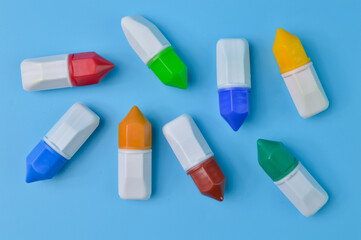 Bunch of watercolor isolated on a blue background.