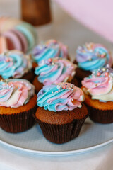 Brown chocolate brownies are muffins made for a children's birthday. Close-up