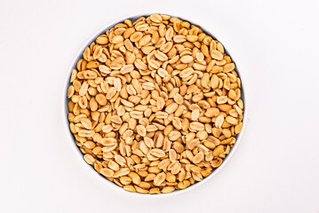 fried peanuts in a plate on a white background