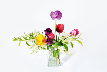 Tulips in a vase isolated on a white background