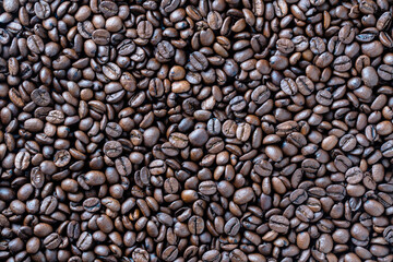 Background of fresh roasted coffee beans, close up, top view