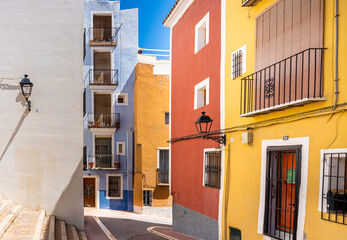 Fototapeta na wymiar Colorful houses and buildings in the tourist town of Villajoyosa, Alicante (Spain)