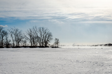 Cold winter day by the St. Lawrence river