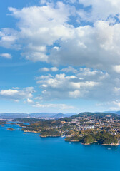 Bird's-eye view from the Tenkaiho Observatory of the saw-toothed coast of Sasebo and Kujūkushima meaning 99 Islands with multiple islets part of Saikai National Park in Kyushu.