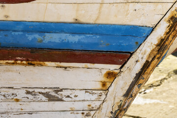 bow of a wreck on the mud at Fuseta, Algarve, Portugal