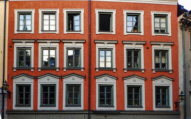 Fototapeta na wymiar Red facade of an old building
