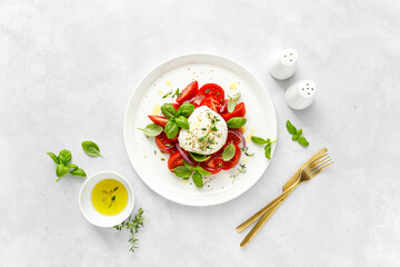 Salad Caprese with tomato, mozzarella and basil, italian food - obrazy, fototapety, plakaty