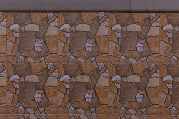 Brown tile with stones