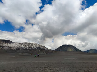 View of mount Bromo with cloudy blue sky as the background