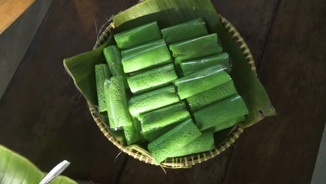 An Traditional Indonesian Snack Called Coconut Rolled Pancakes Served With Winnowing Pan