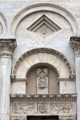 Lucca - detail from St Martin's Cathedral facade. Tuscany